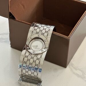 Gucci Silver Twirl Bangle Watch YA112413